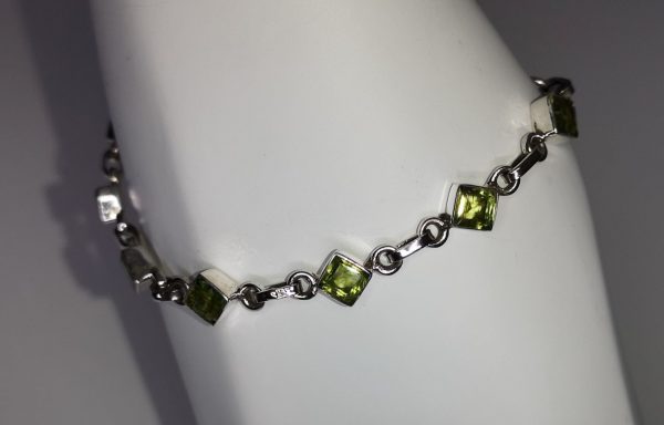 Sterling silver bracelet with square set peridot stones